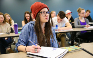 young woman in red hat